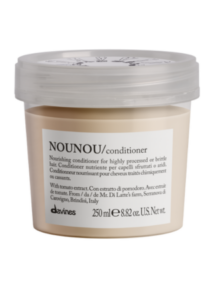 Beauty aus Italien im Plastiktiegel mit beigefarbenem Conditoner als Inhalt von der Marke Davines.