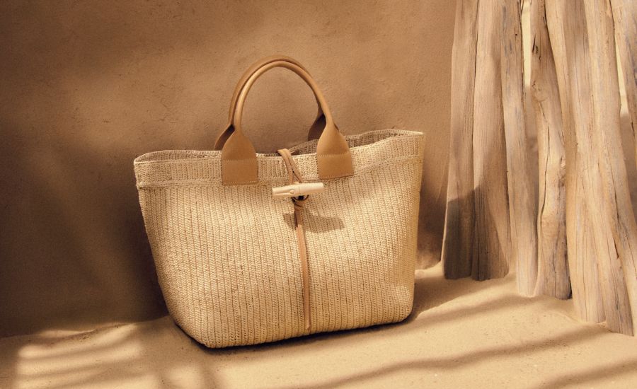 Handwerk aus Madagaskar trifft auf Pariser Design: Die Kooperation von Longchamp und der NGO Anaka stärkt Frauen und bewahrt traditionelles Savoir-faire. Foto: PR